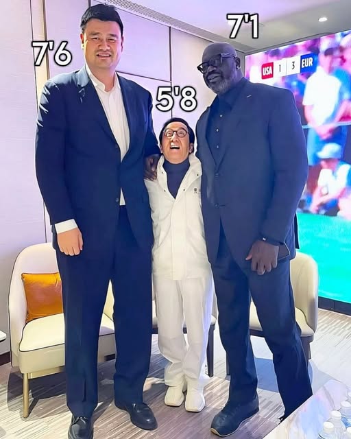 Jackie Chan standing between Yao Ming and Shaquille O'Neal