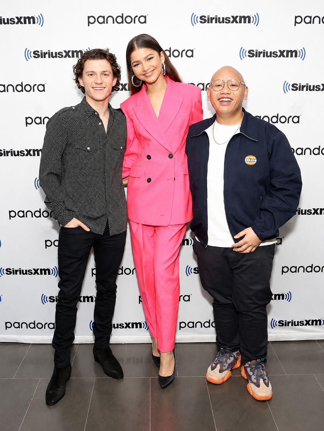 Tom Holland height comparison with taller Zendaya and shorter Jacob Batalon