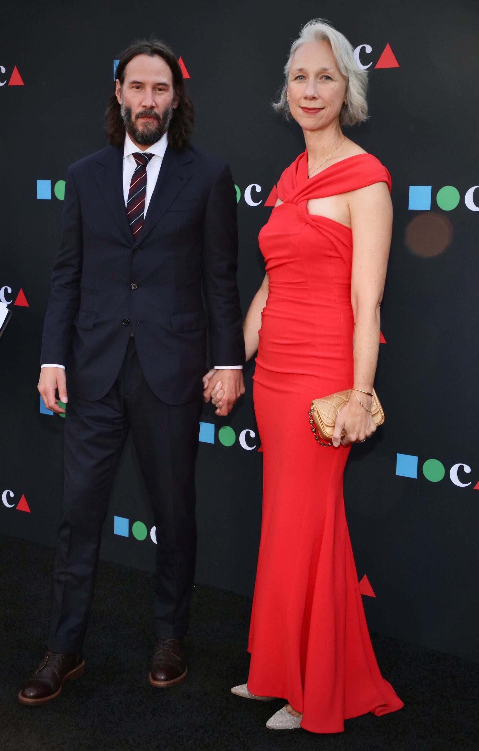 Alexandra Grant and Keanu Reeves height comparison