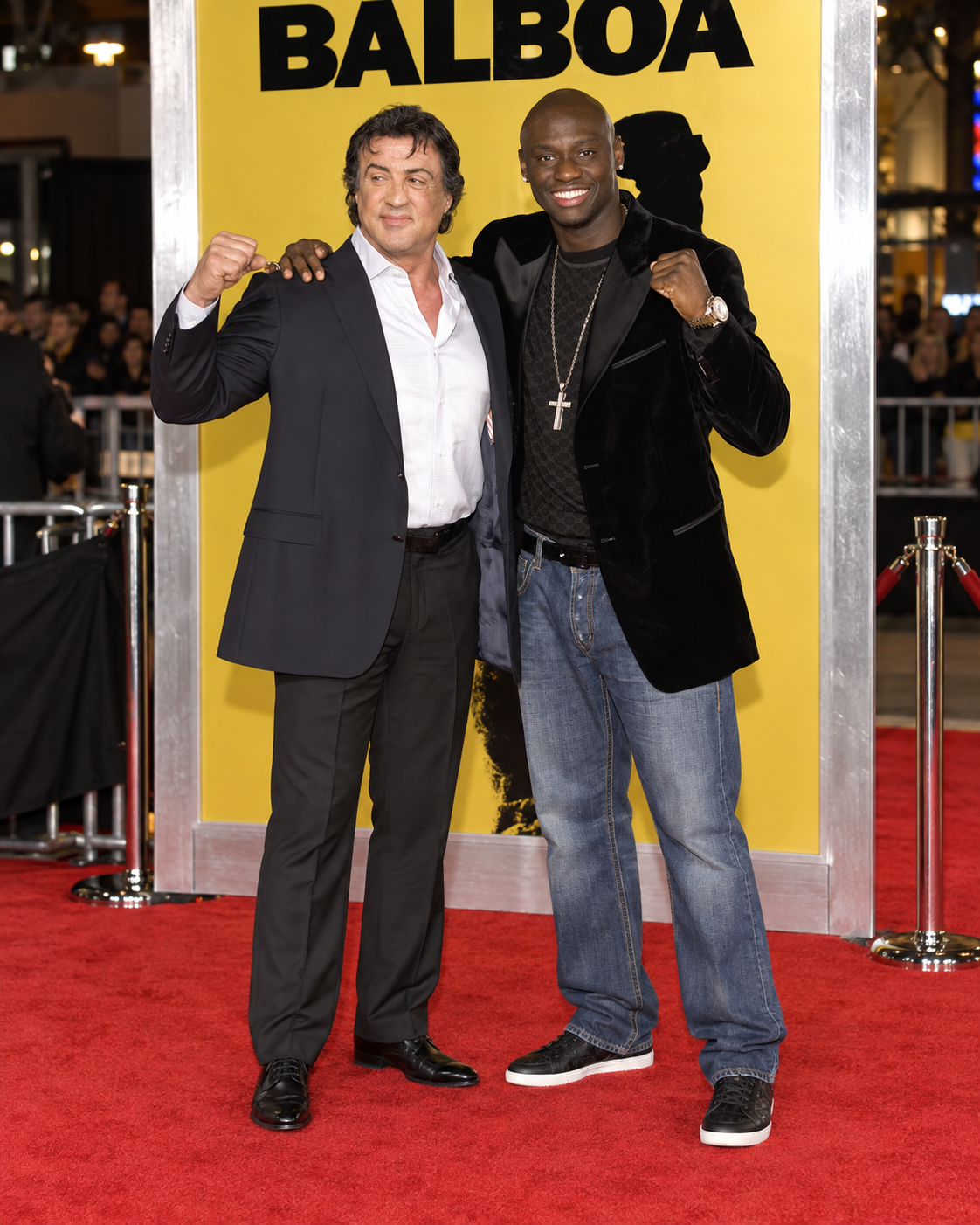 Sylvester Stallone and Antonio Tarver standing together for a height comparison